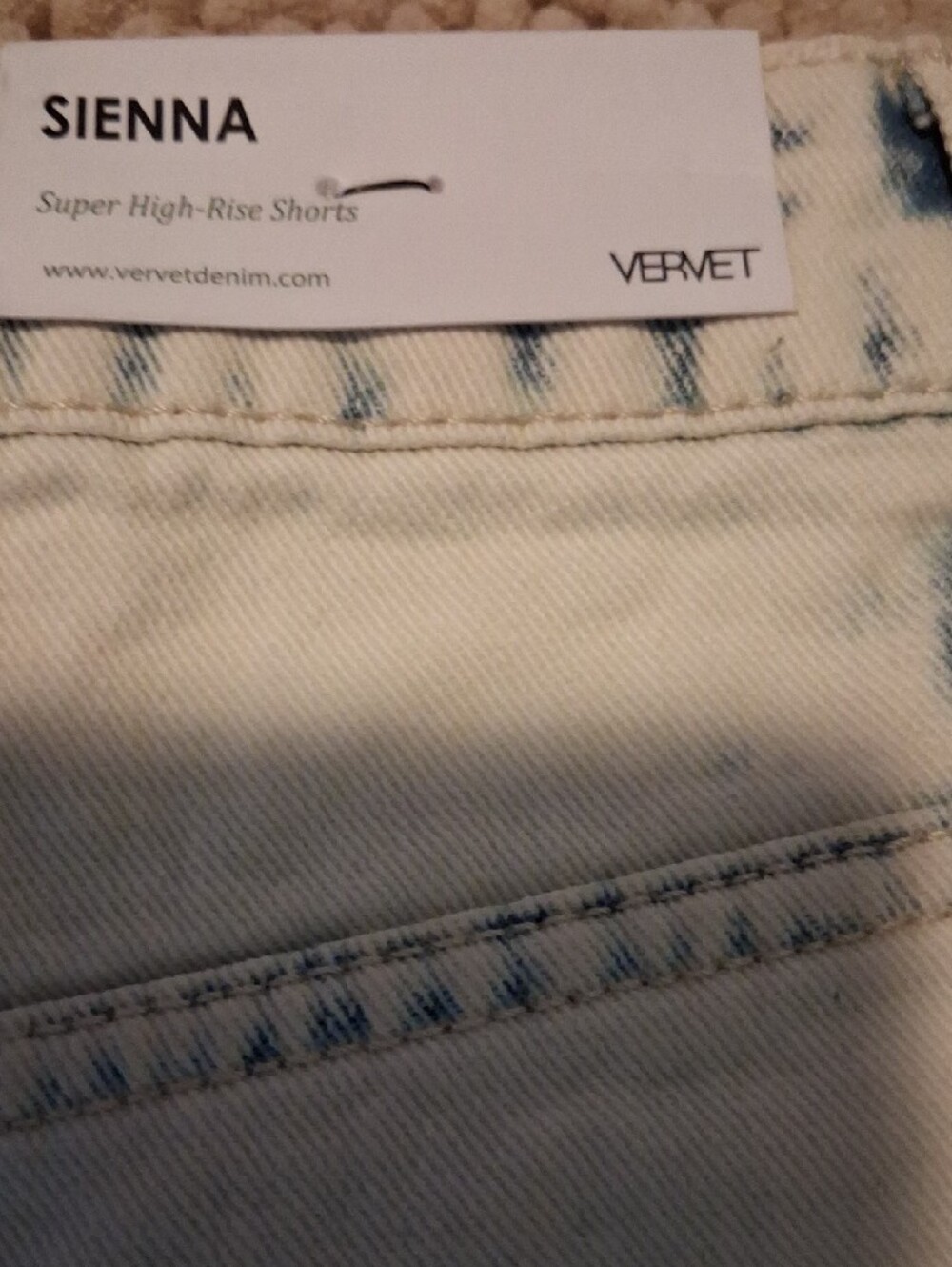 High-Rise Distressed White Denim Shorts with Button Fly - Picture 9 of 12